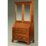 A George III mahogany bureau bookcase,