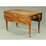 A Regency mahogany Gillows style Pembroke table, with moulded edge and rounded corners to each flap,