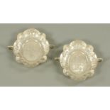 A pair of Continental white metal lobed dishes, 18th/19th century,