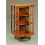 A late Victorian mahogany revolving bookcase, of large form. Width 60 cm, height 119 cm.