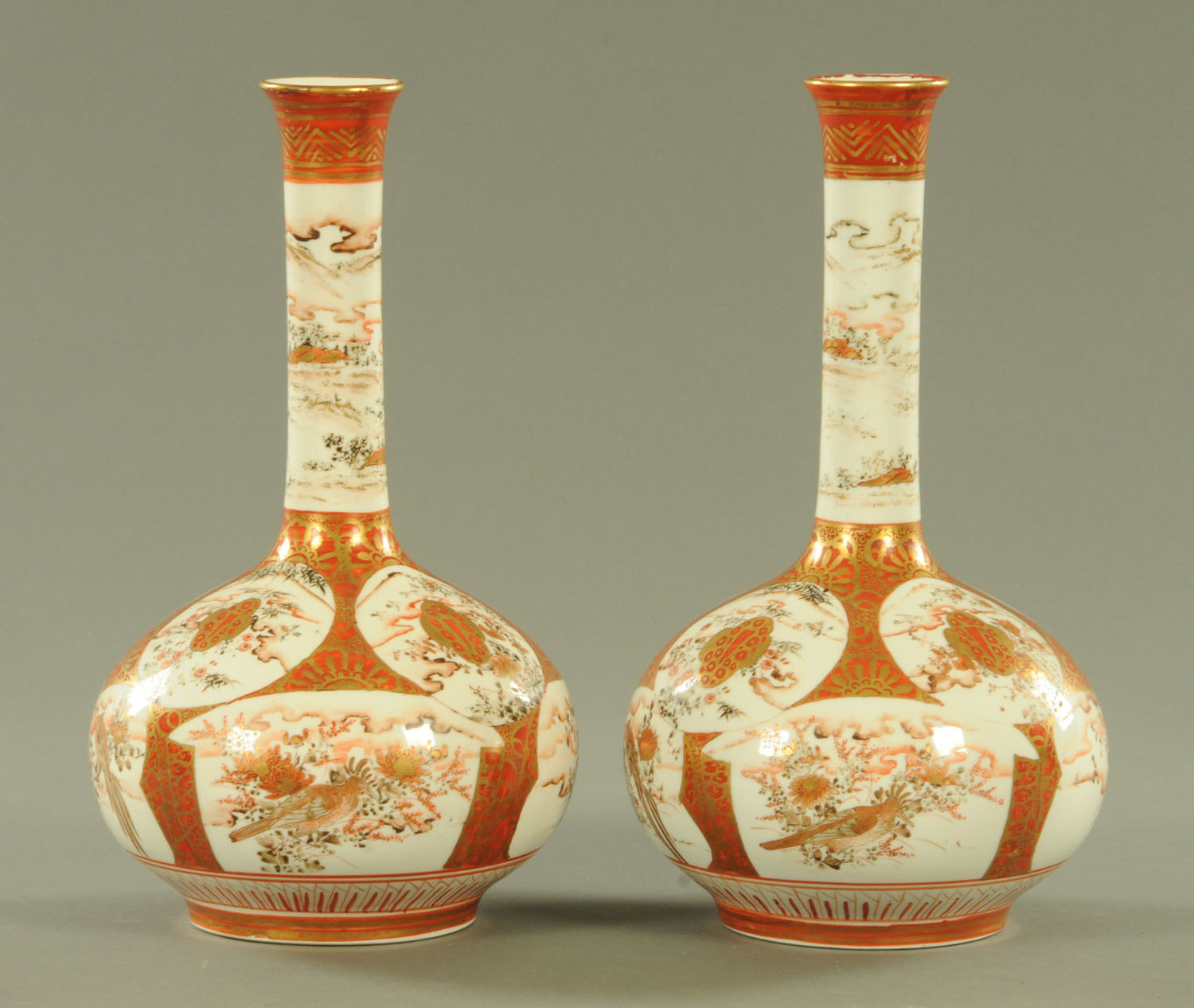 A pair of Japanese Kutani onion shaped vases, Meiji period,