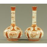 A pair of Japanese Kutani onion shaped vases, Meiji period,