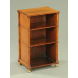 A Regency mahogany small tabletop bookcase, with three open shelves,