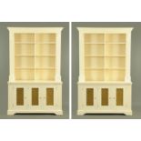 A pair of MDF and pine white painted bookcases in the Regency style,