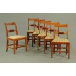 A set of six 19th century Whitehaven pattern dining chairs, with bar backs and shaped centre rail,