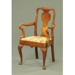 An antique walnut Queen Anne style armchair, with splat back,