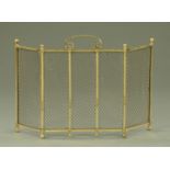 An antique brass spark guard, with wire mesh panels. Length 71 cm.