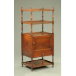 A regency mahogany rectangular whatnot stand, fitted with a cupboard and drawer,