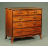 A George III mahogany chest of drawers,