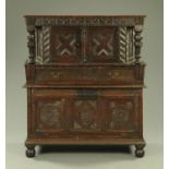 An oak cupboard, with two doors and drawer,