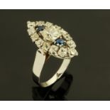 A sapphire and diamond boat shaped ring,