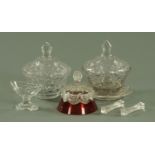 A pair of cut glass bowls and covers, one with stand, height 20 cm, a pair of cut glass knife rests,