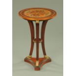 A Regency style specimen wood and brass inlaid occasional table,