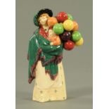 An early Royal Doulton figure "The Balloon Seller", model number HN583,