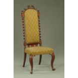 A Victorian mahogany nursing chair,