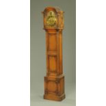 A 1920's oak grandmother clock,
