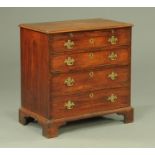 A George III mahogany chest of four drawers,