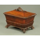 A 19th century mahogany sarcophagus shape wine cooler,