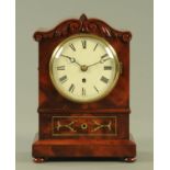 A Regency mahogany and brass inlaid single fusee clock, the enamel dial with Roman numerals,