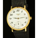 A gentleman's gold plated Longines dress watch, the dial with subsidiary seconds dial,