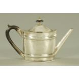 A George III silver bright cut teapot, oval, with ebonised handle, London 1797,