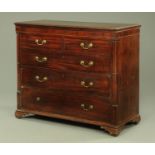 A George III mahogany chest of drawers,