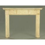 A George III Classical style carved wood fire surround,