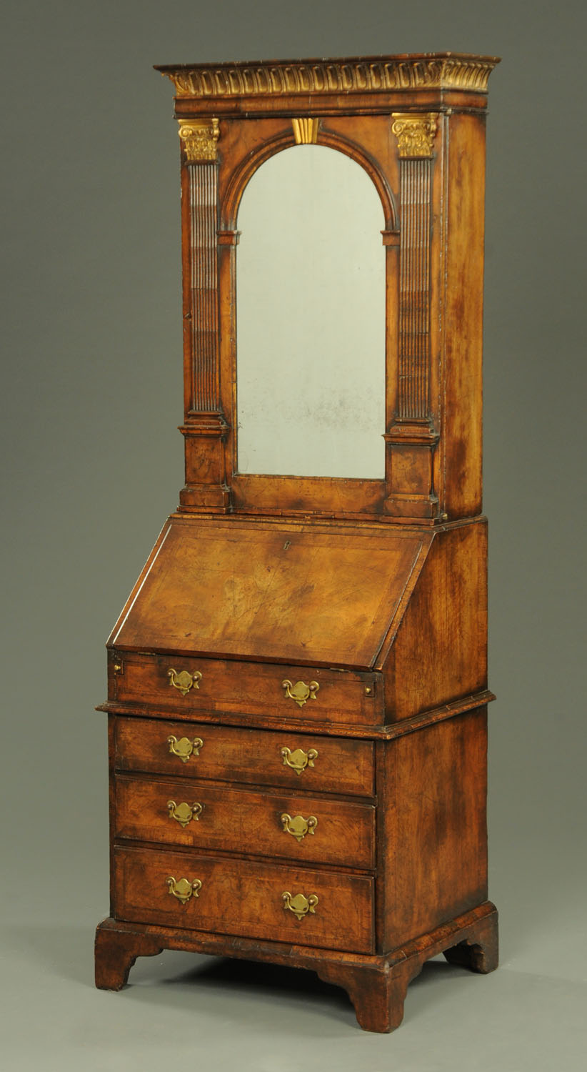 A good walnut and parcel gilt Queen Anne style bureau cabinet,