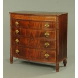 An early 19th century mahogany "Channel Islands" bowfront chest of drawers,