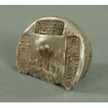 A Chinese silver sycee (ingot), of inverted dome form with three panels of struck character marks,