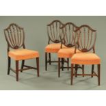 A set of four Hepplewhite style shield back dining chairs,