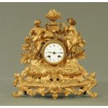 A Victorian gilded spelter mantle clock,
