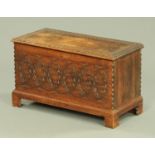A miniature carved oak coffer, late 19th/early 20th century,