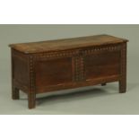 An early 18th century oak coffer,