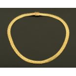 A 9 ct gold flat link necklace, 34.7 grams (see illustration).