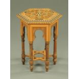 A Syrian bone inlaid and marquetry octagonal topped occasional table. Width 41 cm, height 50 cm.