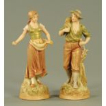 A pair of Royal Dux figures, early 20th century, modelled as a farmer and female assistant,