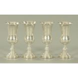 Judaica, a set of four Kiddush silver goblets, Moses Salkind and Reuben Koshie, London 1903.