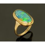 A ladies 9 ct gold dress ring set with opal, size M. CONDITION REPORT: 4.1 grams.