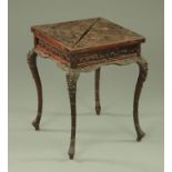 A Chinese carved rosewood envelope card table, late 19th century,