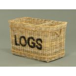 A large woven wicker two division log basket,