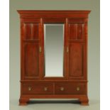 A late Victorian mahogany wardrobe,