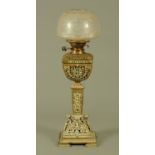 A Victorian classical revival cast brass oil lamp,