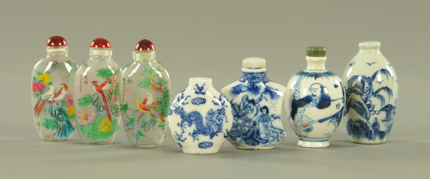 Two Chinese blue and white snuff bottles, late Qing, one decorated with a watery landscape,