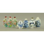 Two Chinese blue and white snuff bottles, late Qing, one decorated with a watery landscape,