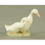 A Royal Copenhagen figure group of two ducks, Model 2128, factory printed and inscribed marks.