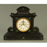 A large Victorian black slate mantle clock, of architectural form, with inset malachite panels,
