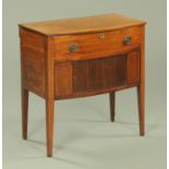 A George III mahogany bow front dressing chest,