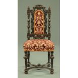 A late Victorian carved oak hall chair,
