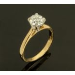 An 18 ct yellow gold ring, set with +/- .